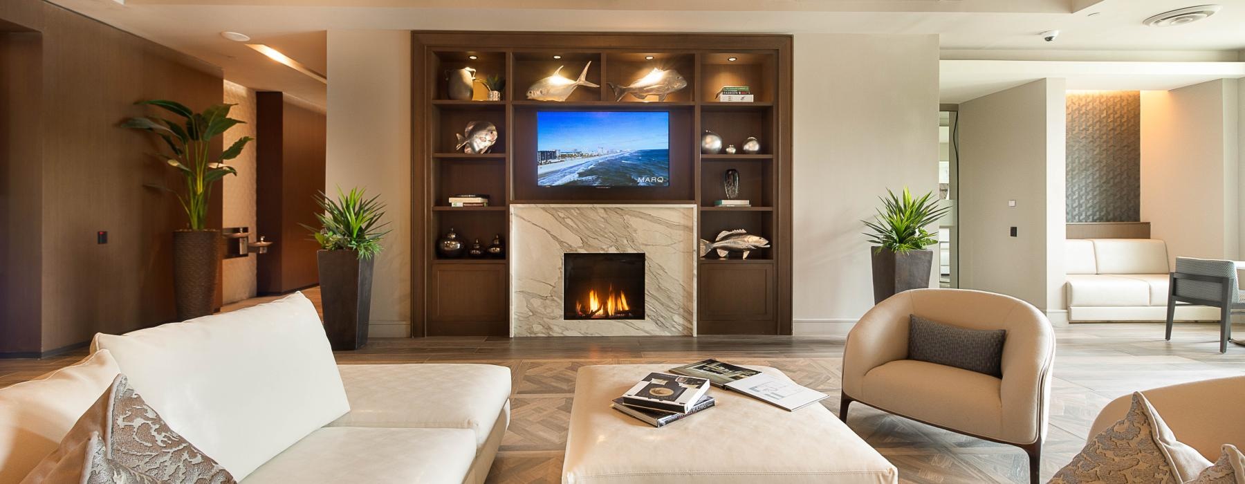 lounge area with a TV and modern decor
